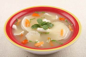 Homemade vegetarian food, meal, organic mushroom soup served in ceramic bowl.
