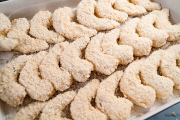 open box with frozen shrimp in batter. semi-finished products for deep frying. 