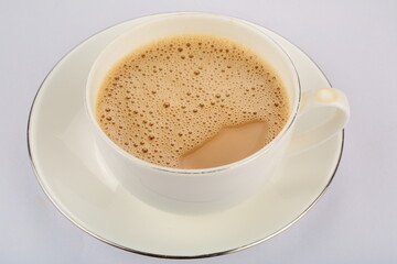 Homemade delicious Indian masala chai, spices milk tea.