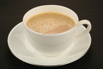 Homemade delicious Indian milk tea, masala chai.