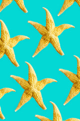 Bright summer pattern with sea stars. Yellow starfish on turquoise, sea summer vacation concept.