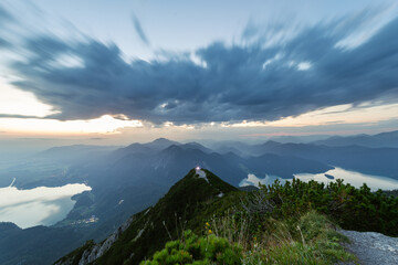 View from the peak of the Herzogstand in Bavaria Germany with a colorful sunrise