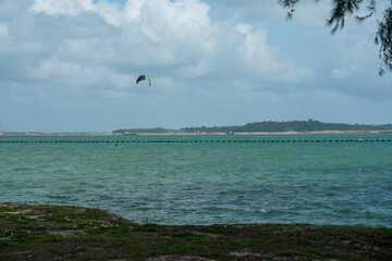 Singapore - Jan 1, 2020:  Paragliding in Changi Beach Park