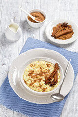 sweet rice pudding with cinnamon and anise star