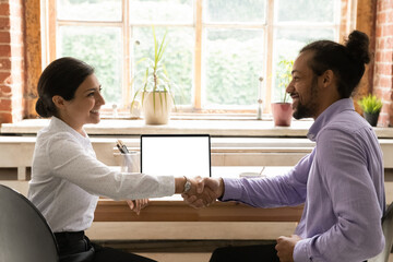 Indian African ethnicity businesspeople or sales manager and client accomplish meeting negotiation...
