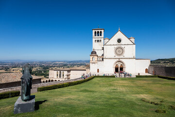 Fototapeta na wymiar Assisi village in Umbria region, Italy. The most important Italian Basilica dedicated to St. Francis - San Francesco.
