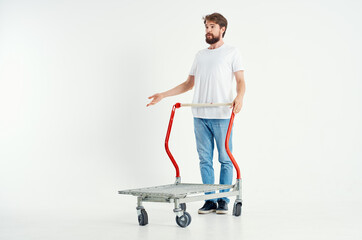 Man in a white t-shirt transport in a box isolated background