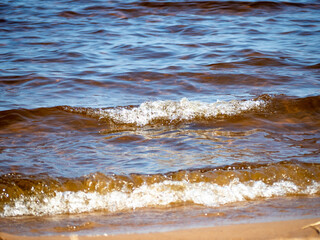 The lake wave in July heat