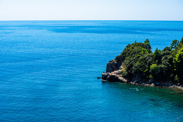 Beautiful colorful seascape. Blue water and blue sky at sunny day