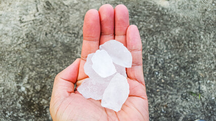 Alum cubes on palm