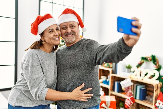 Middle age couple celebrating christmast