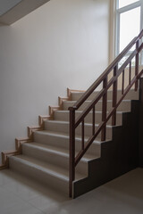 Stairway with brown metallic banister interior modern business office building or home and living architecture decoration design contemporary.