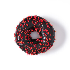 one chocolate donut with red sprinkles on white background