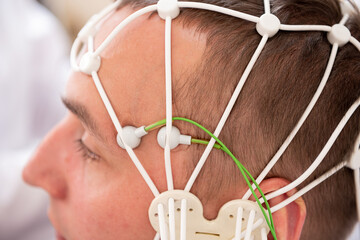 Patient brain testing using encephalography at medical center