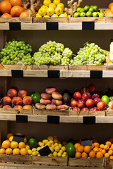 Fruit market with a variety of colorful fresh fruits and vegetables