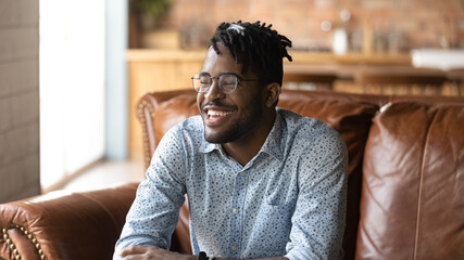 Happy stylish Afro American hipster guy portrait. Young Black man, student, self employed business...