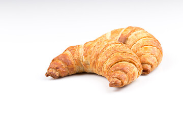 Croissant over white background