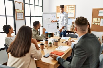 Group of business workers listening boss conference during meeting at the office.