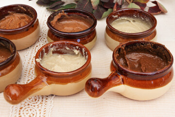 Various hummus and nuts dips.