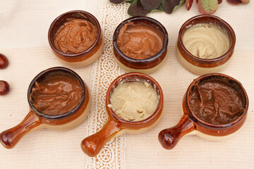 Various hummus and nuts dips.