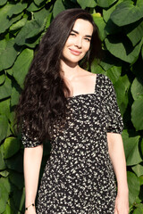 Fototapeta premium Photo beautiful woman in the apple garden