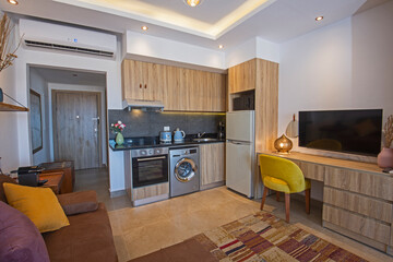 Interior design of luxury studio apartment living room with kitchen