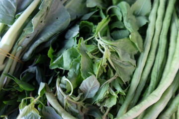 Vegetables and fruits creative flat lay with copy space. Healthy vegetarian meal ingredients. Tasty variety of healthy organic raw food cooking concept