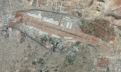 Satellite view of Kabul airport, Hamid Karzai International Airport, houses, streets and buildings...