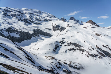 Switzerland, Panoramic view on Snow Alps and Blue Sky around Titlis mountain