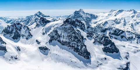 Switzerland, Panoramic view on Snow Alps and Blue Sky around Titlis mountain