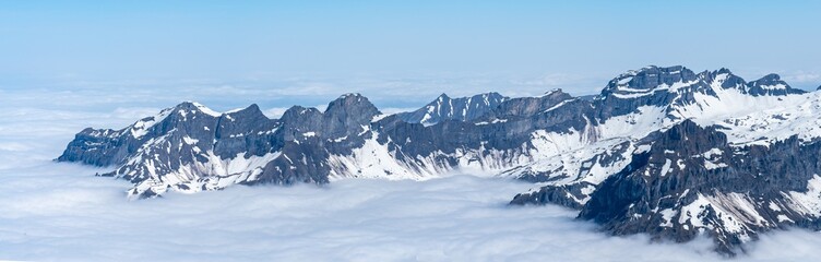 Switzerland, Panoramic view on Snow Alps and Blue Sky around Titlis mountain