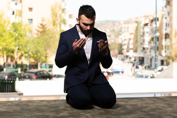 Muslim Man is Praying in the Mosque