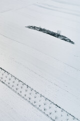 Aerial view of winter countryside landscape covered in snow