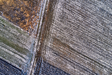 Frozen agricultural landscape as abstract texture or background, aerial view