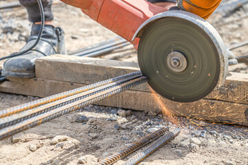 Cutting reinforcement with a hand-held electric tool at a construction site