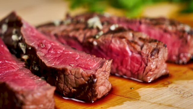 grilled juicy beef steak on board