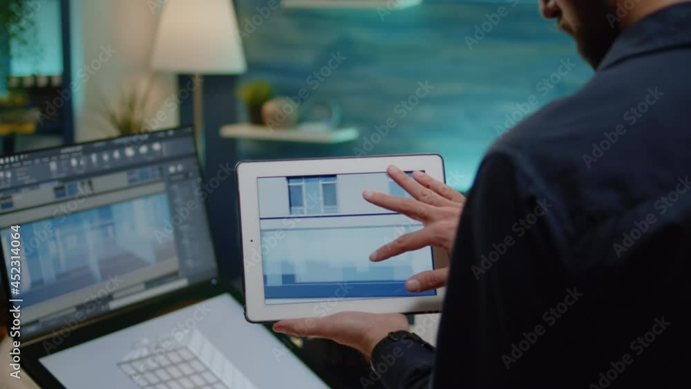 Poster architect holding digital tablet with building model for construction layout in office. man engineer