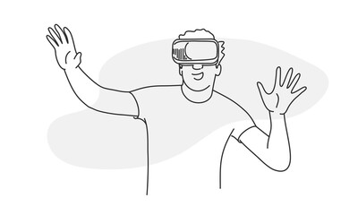 Young man wearing virtual reality headset working on project.