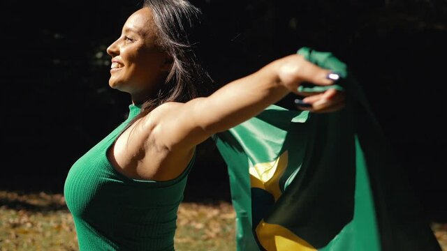 Black woman with Brazilian flag, independence day