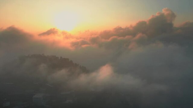 Aerial view of Rishikesh, a township on mountain top during a beautiful sunset, Uttarakhand, India.