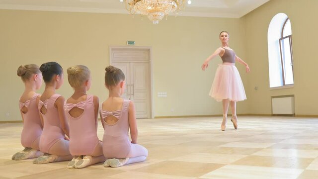 Girls dancers in ballet school learns to dance