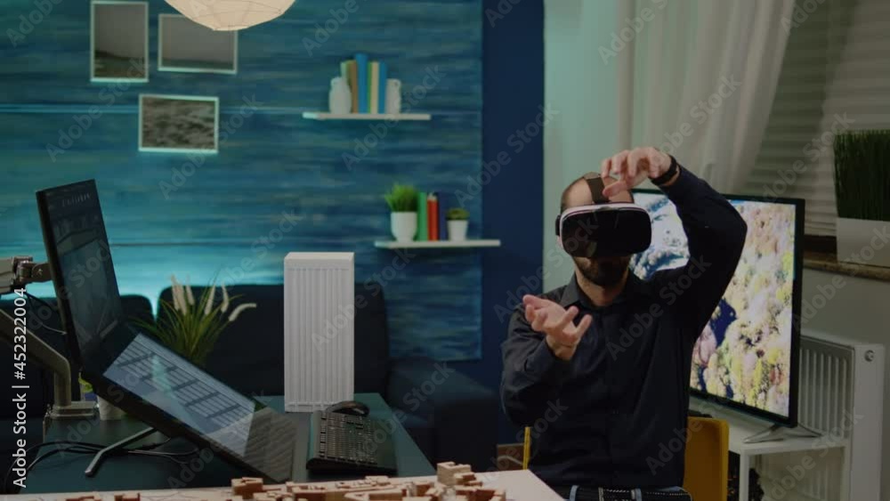 Poster man architect working with vr glasses on building plan development in office. young engineer using t