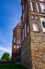 Old beautiful medieval castle fortress with towers. Ancient european architecture