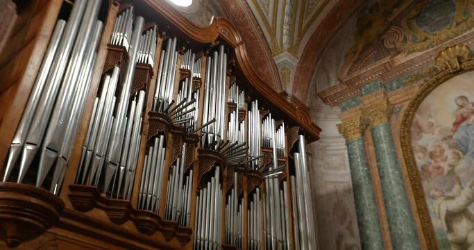 Old beautiful organ in Rome, Italy. The interior of the old roman church