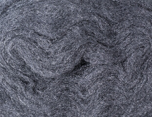 steel wire wool closeup, fine abrasive material for polishing, surface background, texture