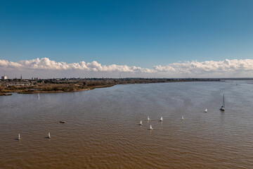 Aerial view of small sailboats for boys, called Optimist

