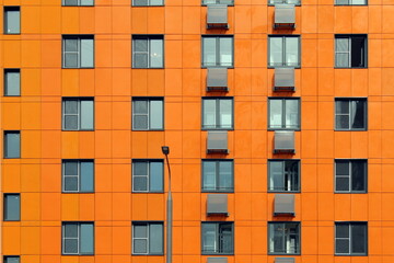 Texture unusual abstract orange house with windows