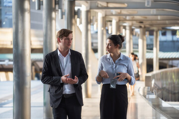 Business team discussion in city during transportation