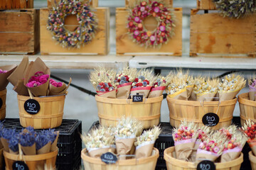 Beautiful bouquet with dried flowers in paper boxes. Stylish wedding decorations. Floral design.