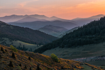 beautiful scenery of some mountains at sunset